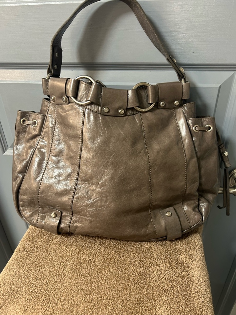 Francesco Biasia slouchy hobo style shoulder bag. Gray leather W/silver hardware